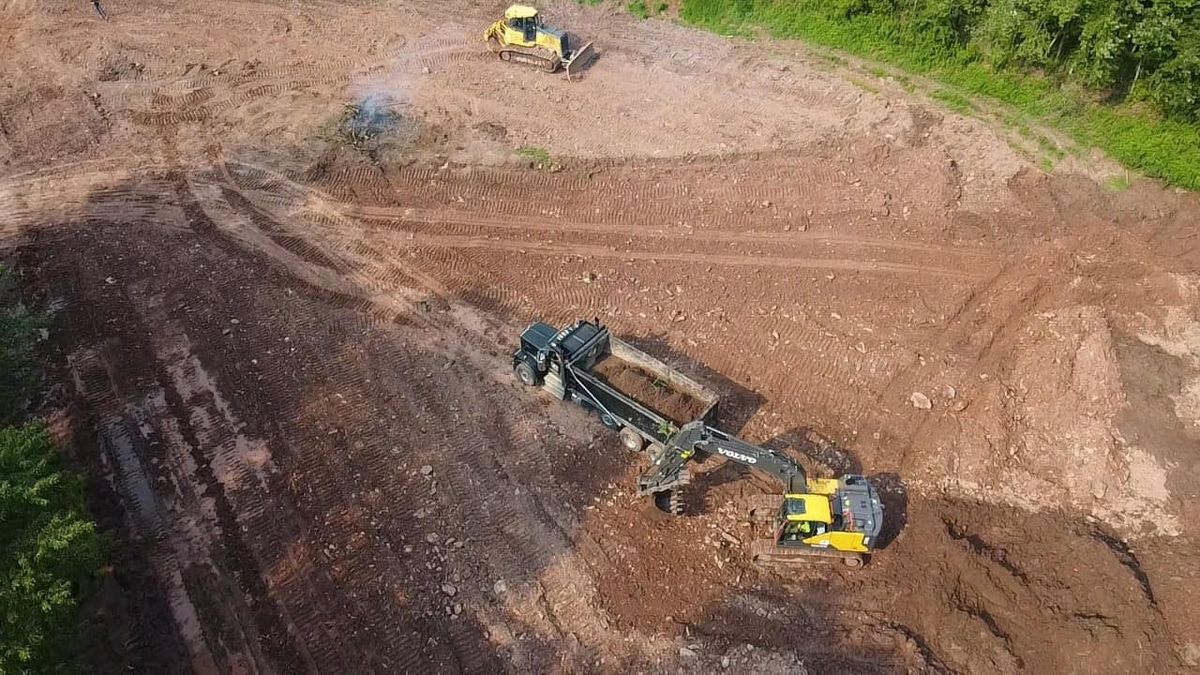 Aerial overhead view of completed subdivision lot layout with paved roads